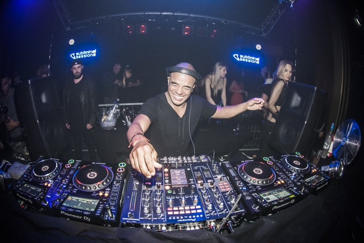 Panama Club nightclub Amsterdam dj mixing music having fun console