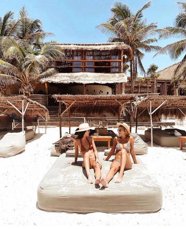 Papaya Playa beach club Tulum pretty girls day bed tanning drinking day party