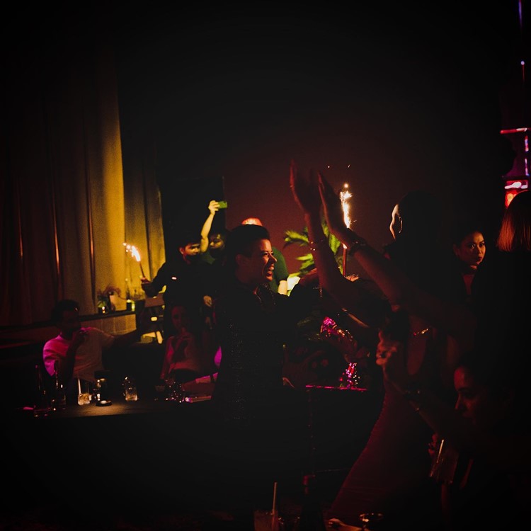 Papillon nightclub Dubai crowd people having fun partying celebrate bottle parade 