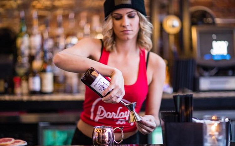 Parlay sports club Chicago sexy blonde bartender pouring shots alcohol drinks