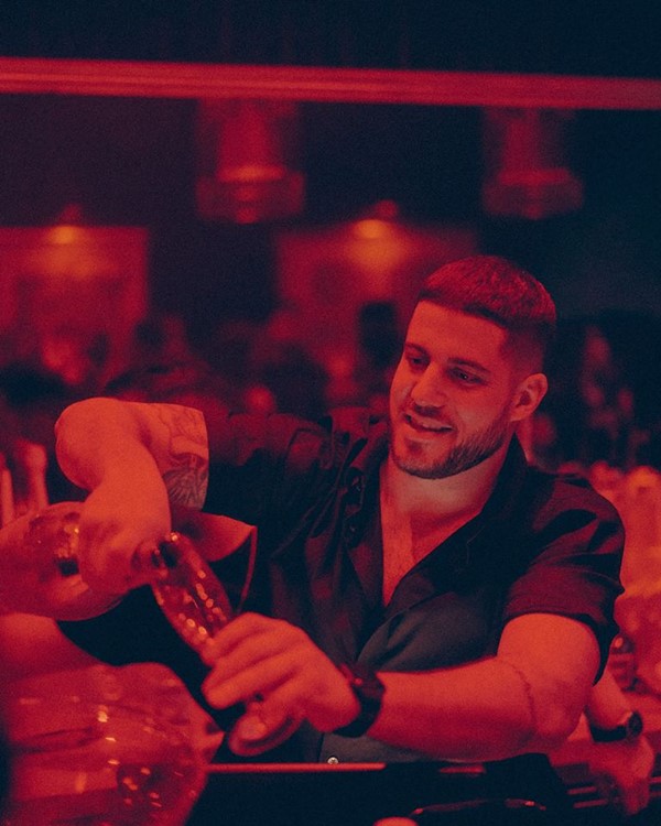 Peopl nightclub Montreal bartender pouring champagne alcohol glass cocktail drink all night