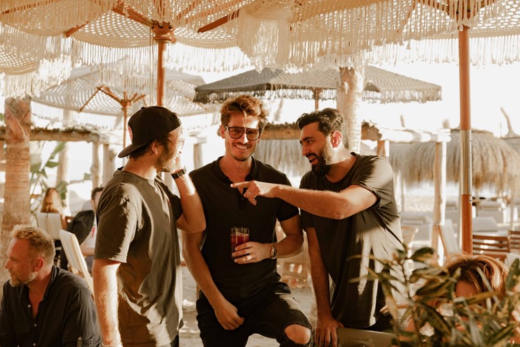 Playa Padre beach club in Marbella guys handsome men table booking vip fun party