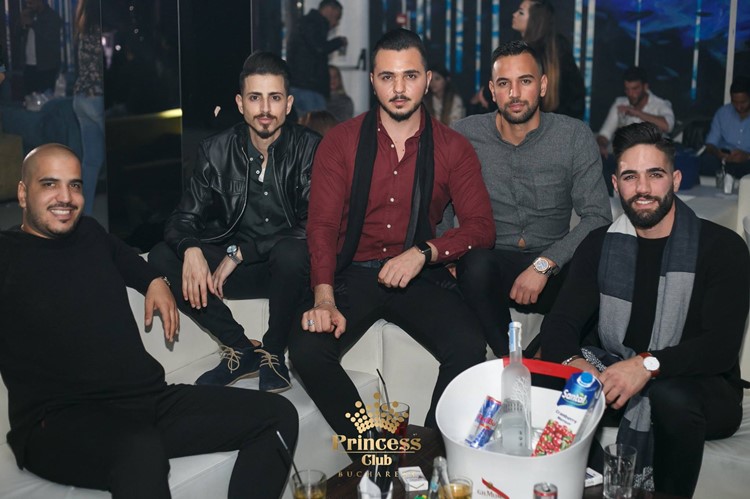 Princess Club nightclub Bucharest men drinking alcohol bottles vodka champagne table reservation fun
