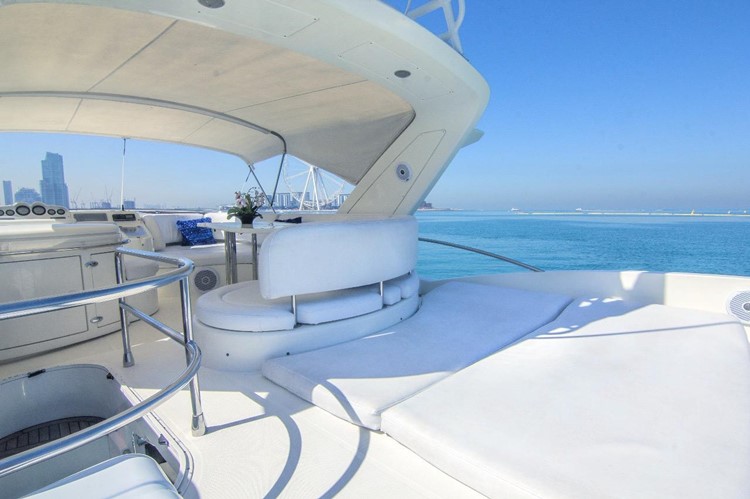 Private boat Dubai rental lounge couch outdoor