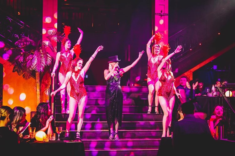 Proud Embankment nightclub London cabaret show dancers exotic costumes stage