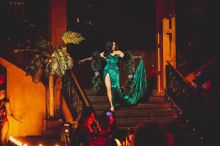 Proud Embankment nightclub London beautiful dancer long green emerald dress stage dance pole exotic show go out tonight have fun best club drinks cocktails