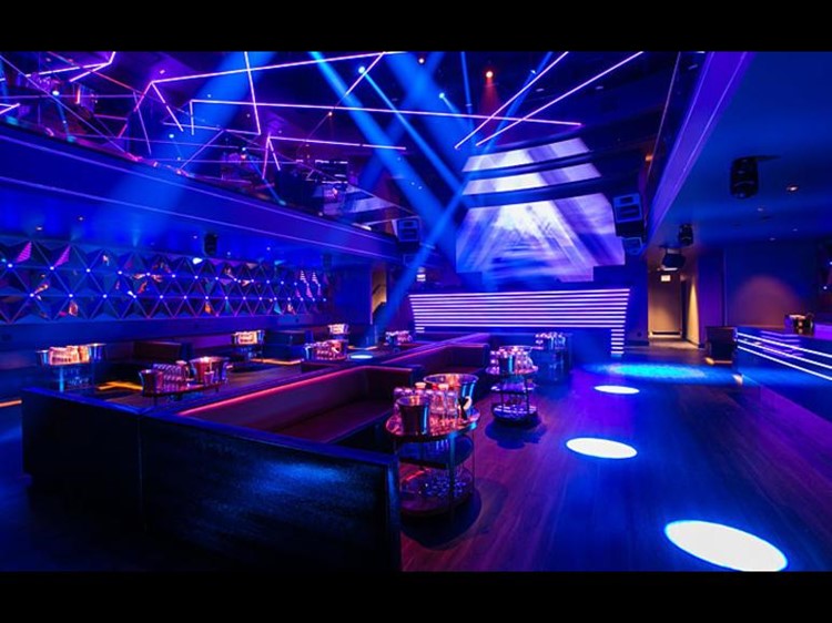 Prysm nightclub Chicago lounge area alcohol bottles 