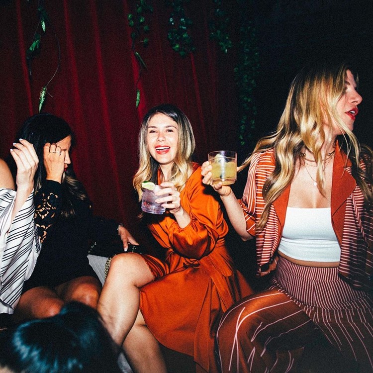 Public Arts nightclub New York blonde girls having fun table booking guest list cocktails drinks