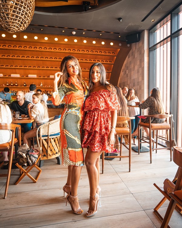 Puerto 99 restaurant Dubai pretty dresses mini long dresscode brunette high heels go out nightout party 