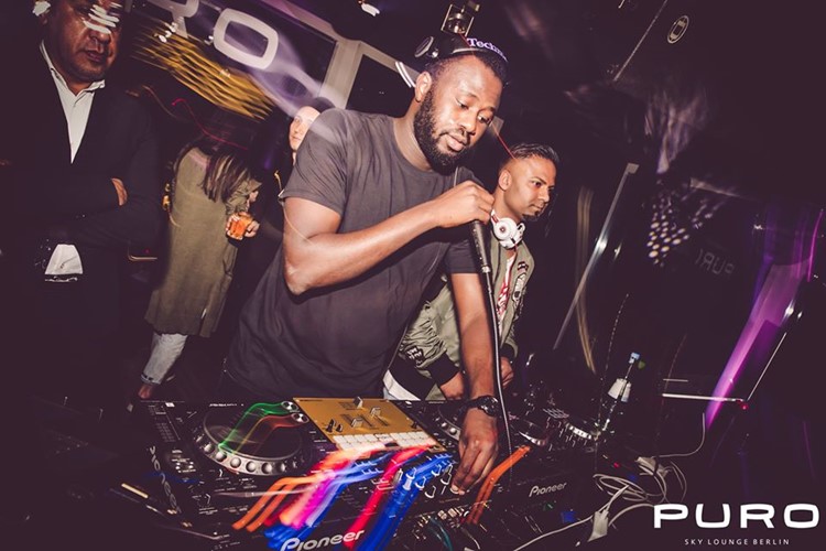 Puro Sky Lounge nightclub Berlin dj mixing music rapper singer live music fun parties events