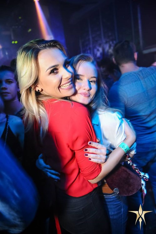 Radost FX nightclub Prague pretty blonde girls hugging dance fun night out party