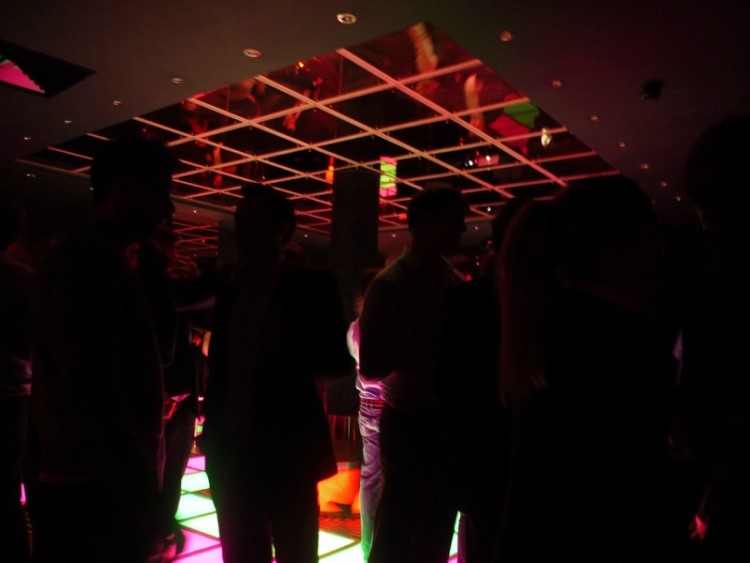 raffles nightclub london people having fun and drinking alcohol at party