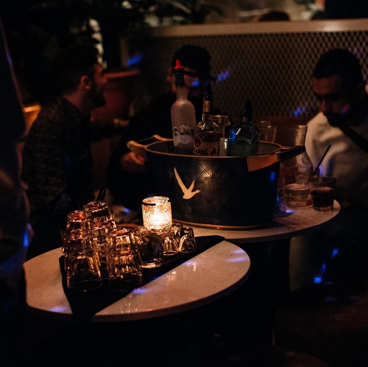 Riverside club Montreal book your own vip table service now vodka champagne bubbles bucket alcohol bottles celebrate