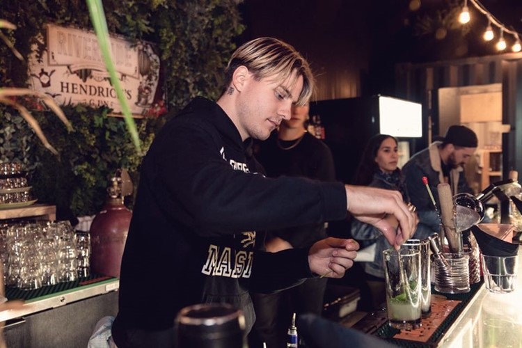 Riverside club Montreal bartender pouring drinks cocktails beverages fun party guest list entry go out cool events