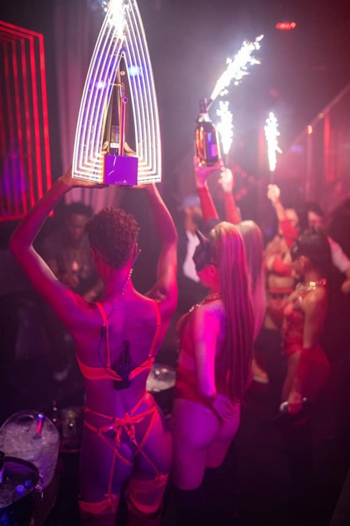 Rockwell nightclub Miami waitresses in lingerie bringing alcohol bottles to table booking reservation service birthday hen bachelor party