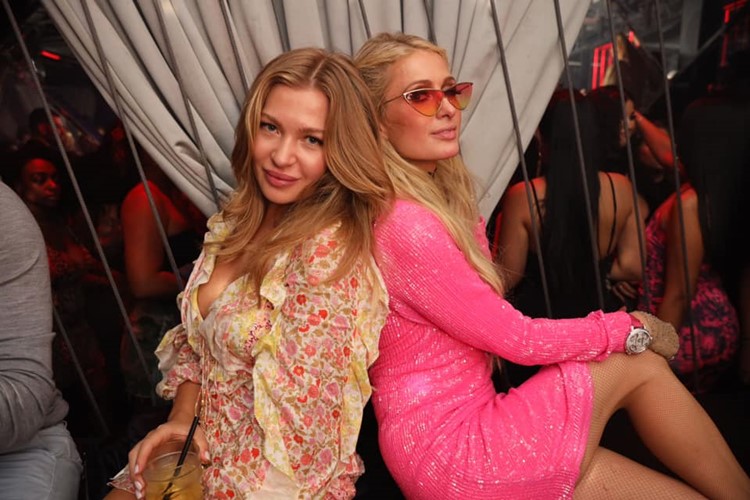 Rockwell nightclub Miami famous celebrity Paris Hilton with blonde friend mini pink dresses having fun partying