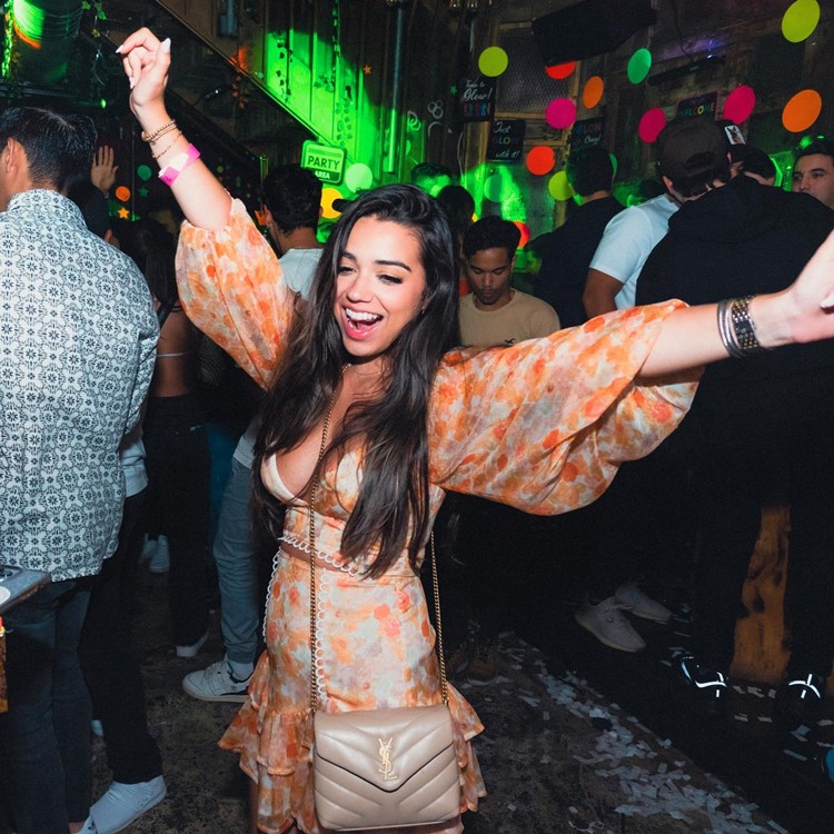 Rosario nightclub Miami brunette girl having fun dancing clubbing 