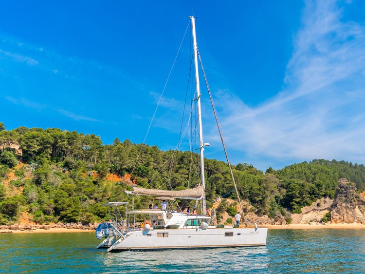 Side veiw of sailing catamaran