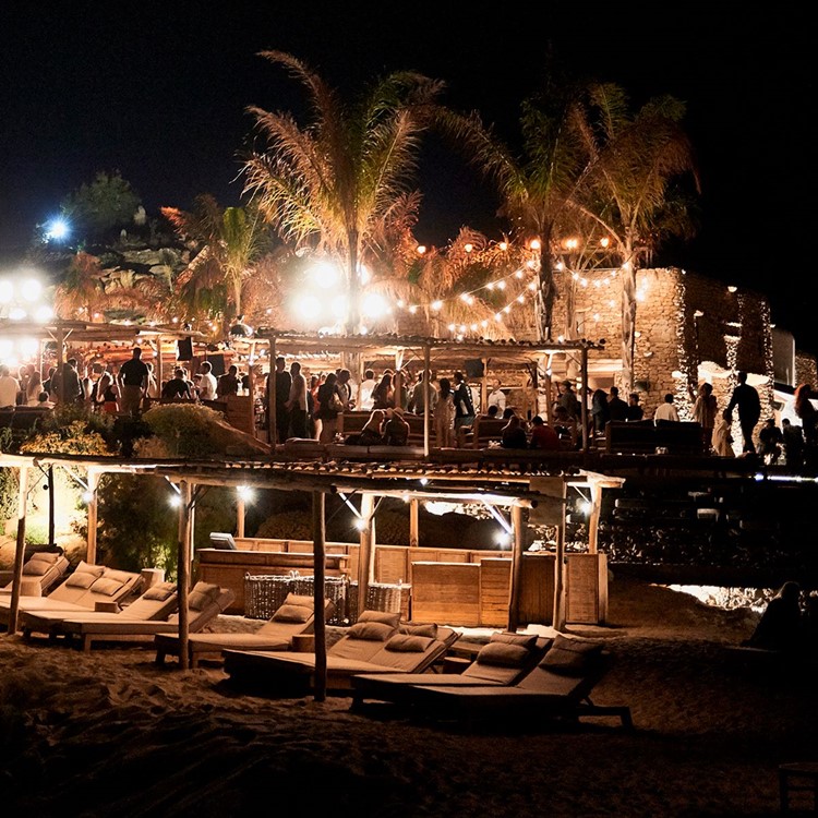 Scorpios beach club Mykonos nightclub outdoor party book your table sunbed cabana