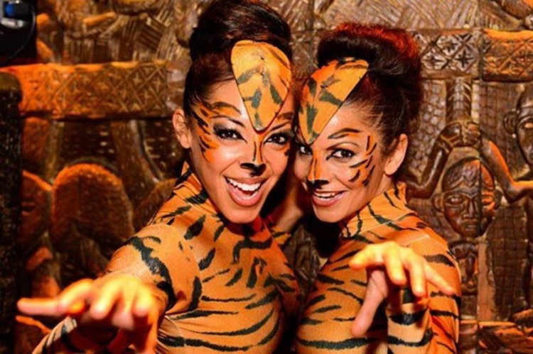 Shaka Zulu London club restaurant girls dressed as tigers costumes facial make up