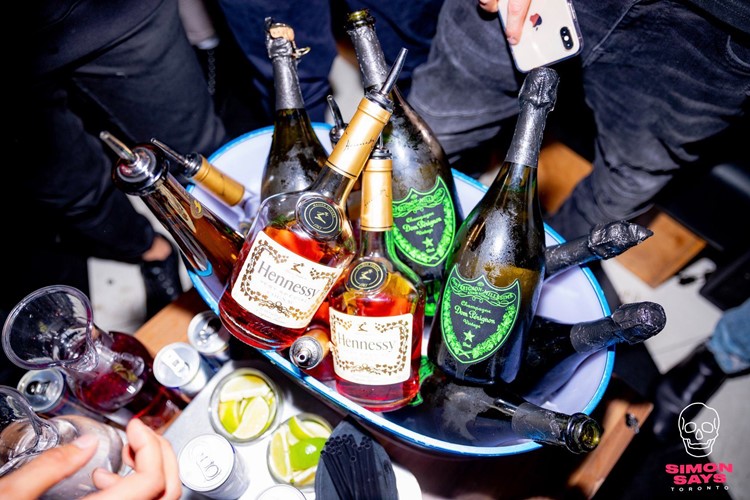 Simon Says nightclub Toronto alcohol bottles service table vip area champagne vodka luxury
