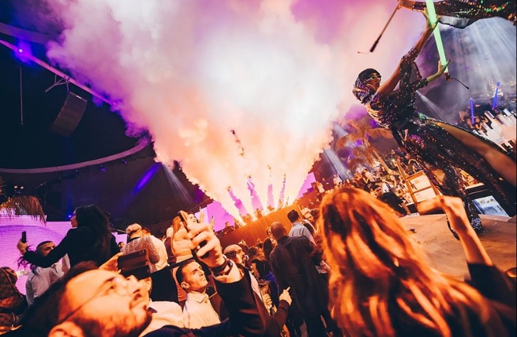 Sky 2.0 nightclub Dubai dancers dancing fun night music dj mix exclusive crowd fancy dress code