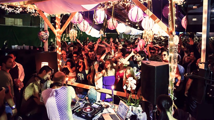 Sky Room nightclub New York City rooftop club people having fun at party event