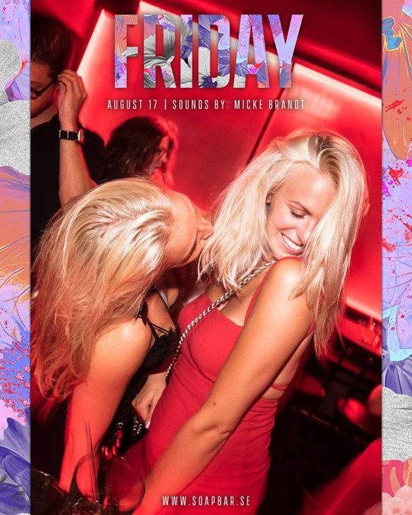 The Soap Bar nightclub Stockholm sexy blonde girls in mini dresses and high heels having fun dance party