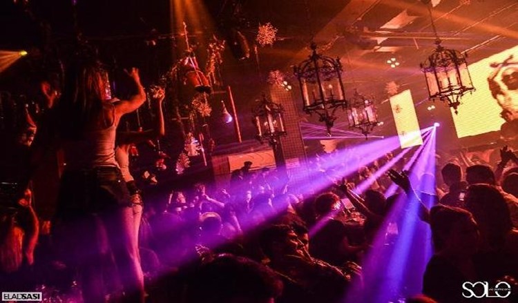 Solo Club nightclub Tel Aviv lights show exotic dancer chandeliers