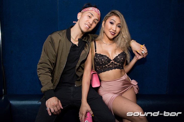 Sound Bar nightclub Chicago hot blonde girl with boy hugging drinking