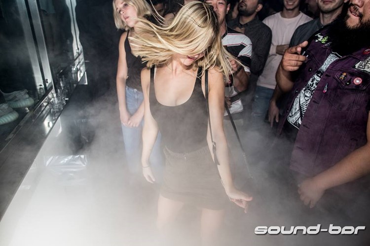 Sound Bar nightclub Chicago blonde girl in mini dress dancing