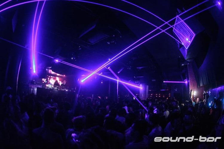 Sound Bar nightclub Chicago people dancing having fun lights show