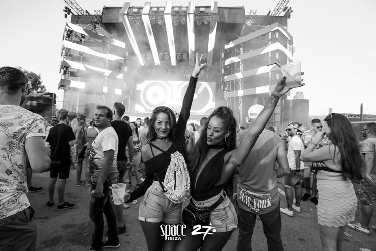 Space nightclub Ibiza two sexy girls having fun 