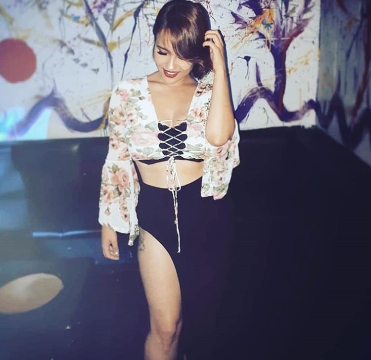 Stadium nightclub Toronto pretty brunette girl dressed in sexy black skirt