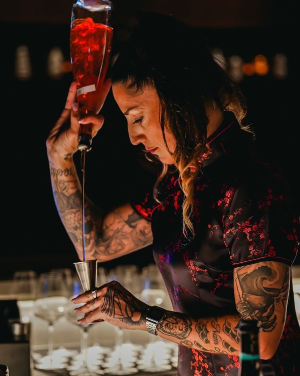 Sumosan club Dubai waitress bartender mixing drinks alcohol bottle service fun party event