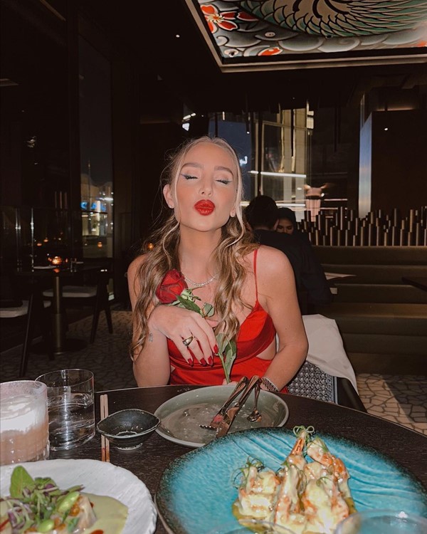 Sumosan club Dubai pretty blonde girl in little red dress partying dancing nightout clubbing