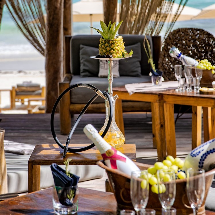 Taboo beach club in Tulum alcohol champagne bottle reserve vip table