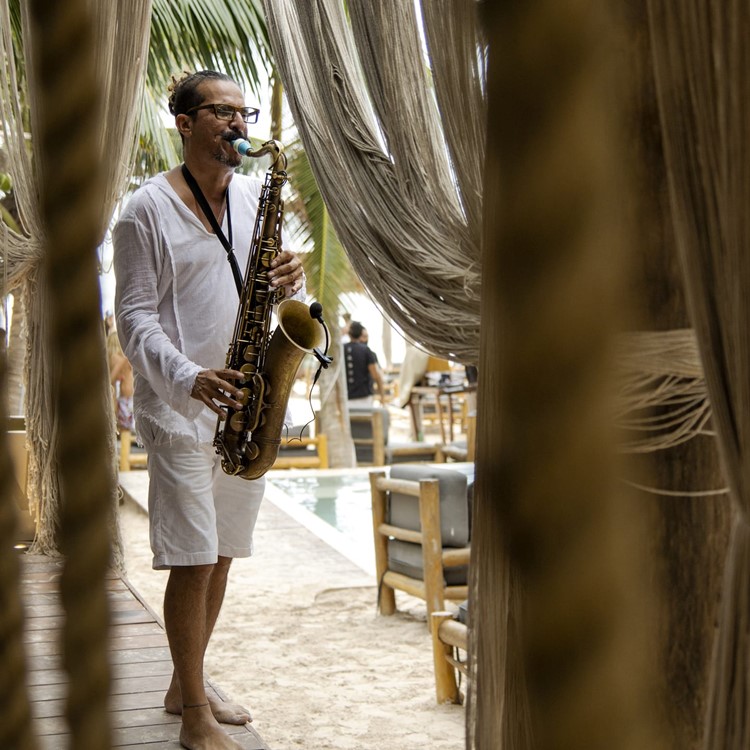 Taboo beach club in Tulum saxophone player singer concert live music event holiday