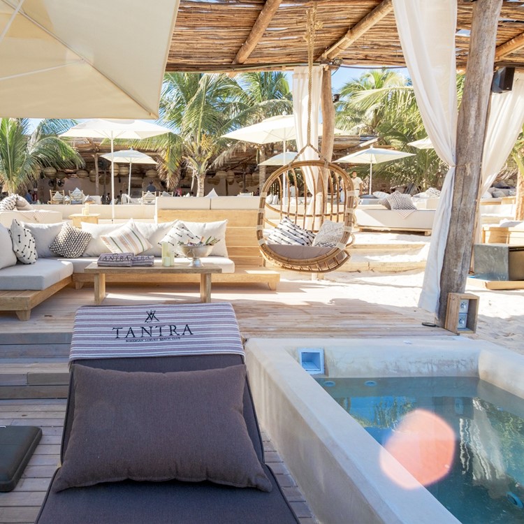Tantra beach club Tulum outdoor terrace lounge day bed sunbed