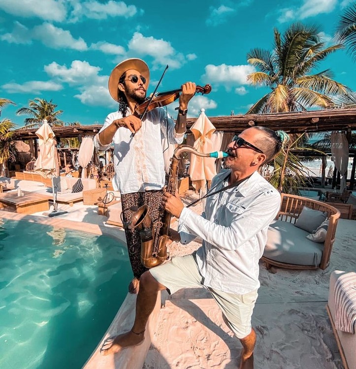Tantra beach club Tulum live music saxophone violin dj instruments party concert