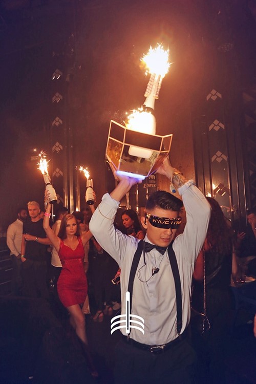 Teatro Barcelo nightclub Madrid alcohol bottles carried by waiter and waitresses to vip area book your own table now reserve package champagne vodka