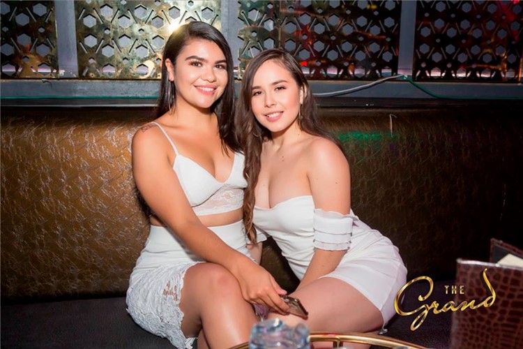 The Grand nightclub San Francisco two sexy brunette girls all white drinking alcohol