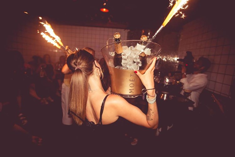 The Zoo Club nightclub Copenhagen waitress big bottle of champagne alcohol vodka table service