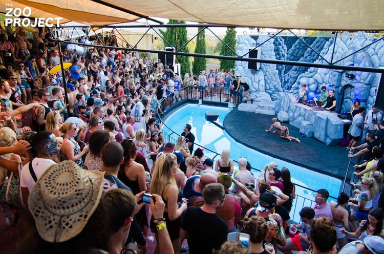 The Zoo Project festival party Ibiza crowd watching show dancer wearing leopard costume