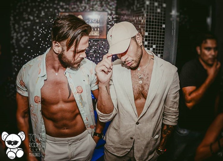 Toy RoOm nightclub Mykonos sexy men guys wearing white shirts fit men having fun