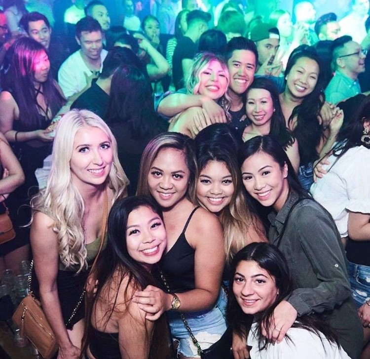Uniun nightclub Toronto group of pretty brunette and blonde girls hugging
