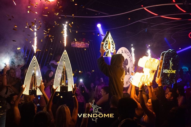 Vendome nightclub in Miami club clubbing champagne vodka rum gin alcohol book table