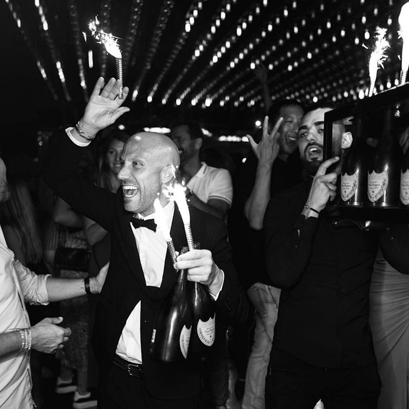 vip room st tropez nightclub very beautiful pretty young blonde girls dressed sexy with black high heels friends partying at night party