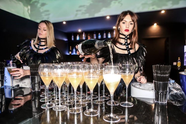 Vog nightclub Paris waitresses pouring drinks champagne luxury bubbles alcohol