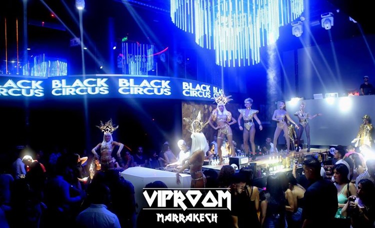 Vip Room nightclub Marrakech fun party light show sexy dancers white costumes exotic dance show